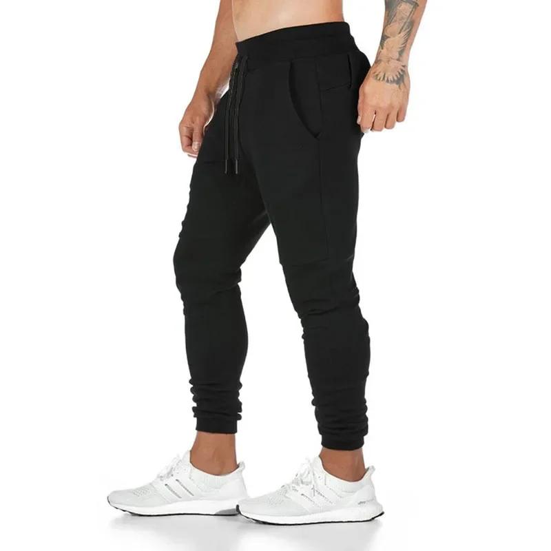 Men's Trousers Thin Fitness Training Pants Men's Cotton and Polyester Elastic Closed Feet Pants Slim Pants.