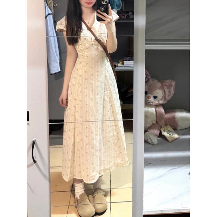 

Summer new French V-neck floral dress, femininity, advanced sense of vacation style, waist and thin a-word long skirt S