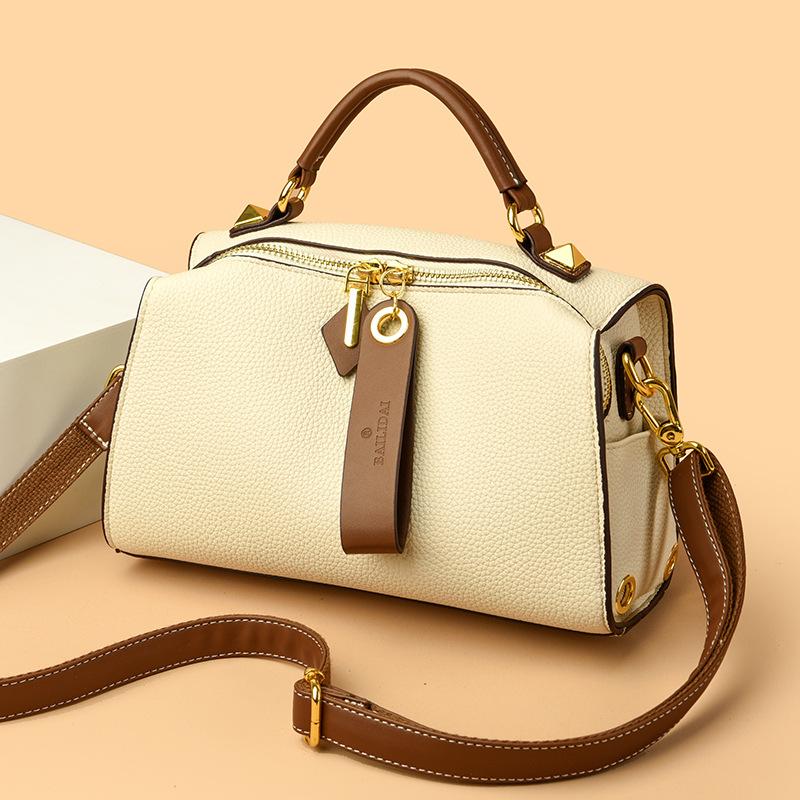 Women's bag new fashionable retro women's portable oblique span shoulder large capacity women's bag simple pillow bag
