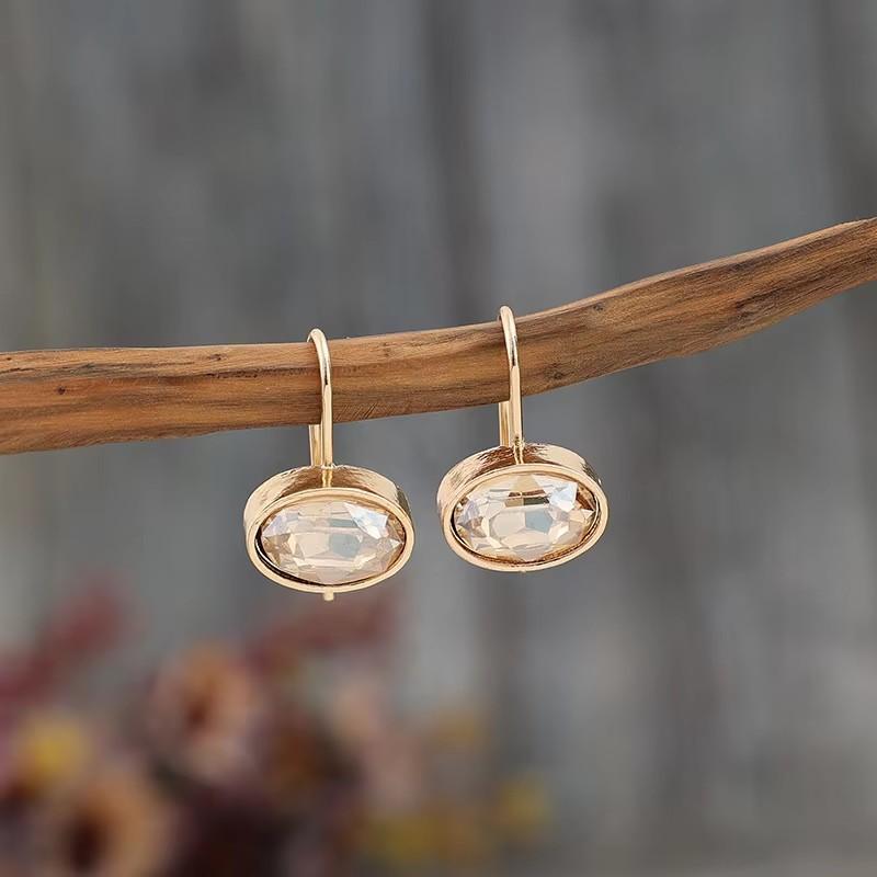 

Fashion Metal Gold Color Oval Champagne Stone Dangle Earrings for Women Exquisite Engagement Wedding Earrings Zircon