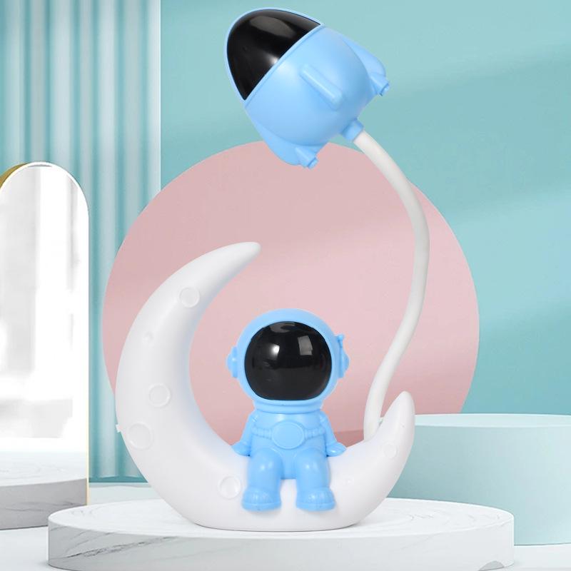 Astronaut LED Night Light: Moon Man Bedside Lamp for Student Dorms, Reading, and Desk Atmosphere.
