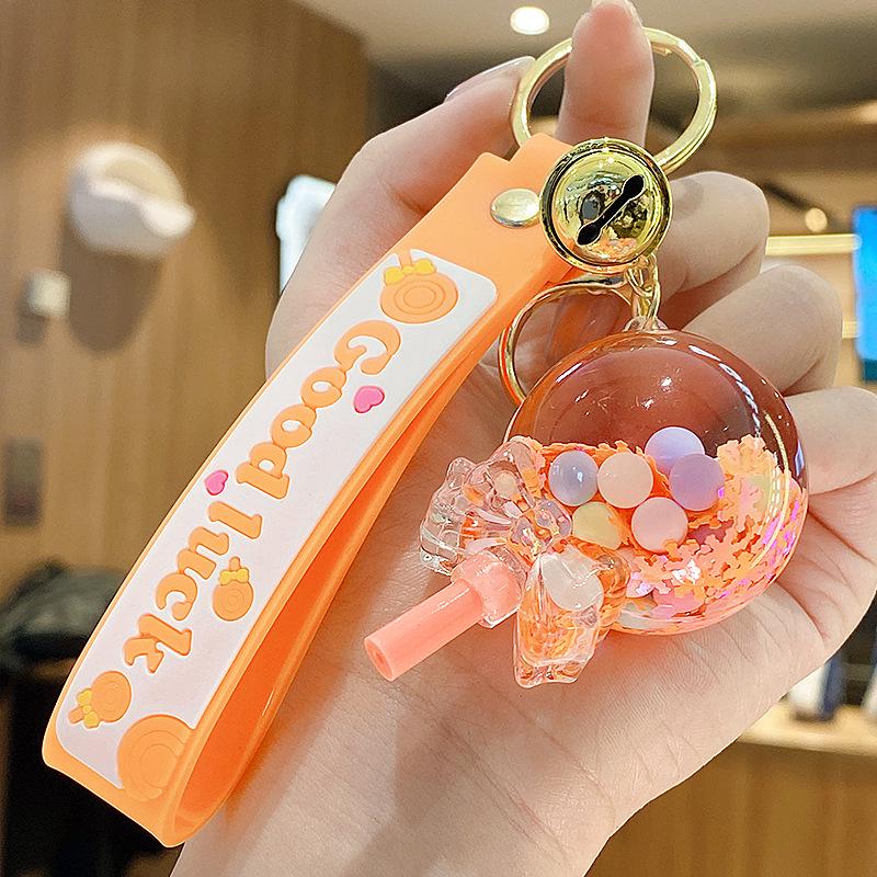 Klíčenka s ozdobou ve tvaru lízátka se sněhovými vločkami a tekutým pískem pro ženy a dívky