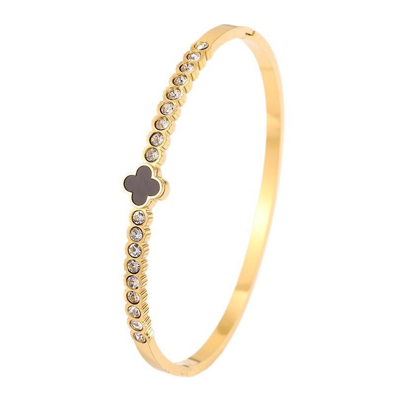 Titanium steel  women's light luxury high-end sense four-leaf flower with diamonds does not fade lucky grass open  