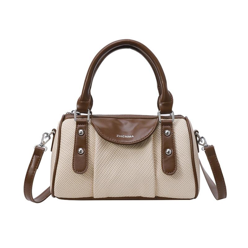 

Niche simple personality portable pillow bag Korean version of high-end temperament commuter style messenger women s bag коричневый