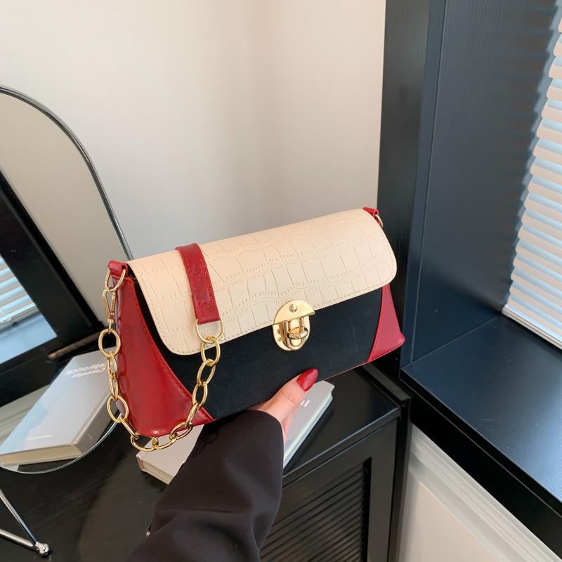 Personalized Contrasting Color Splicing Bag for Women's New Popular Crossbody Bag One Shoulder Armpit Bag Stone Pattern Bag