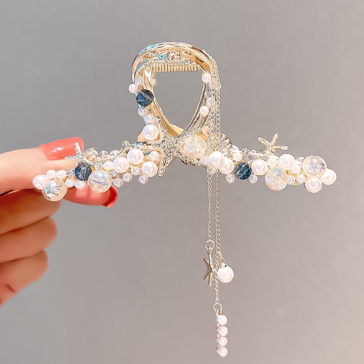

Elegant Golden Toned Alloy Hair Claw Large Pearl & Crystal Tassel, Rectangular Shape with Starfish & Shell Accents for Stylish Updos