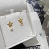 Asymmetrical Pearl and Star Letter CD Earrings - Trendy Women's Fashion