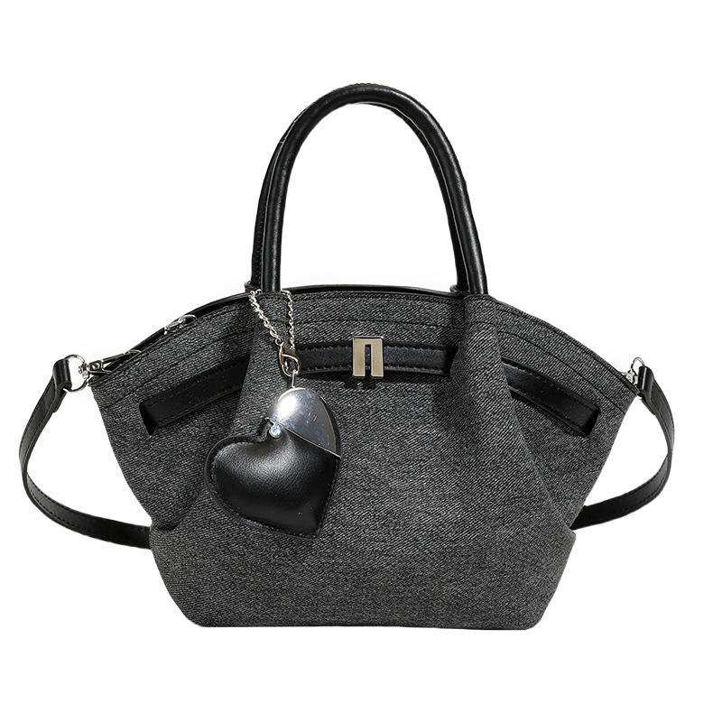Korean senior sense of bucket shape soft and durable fashion exquisite new light luxury commuting slanting cross shoulder handbag