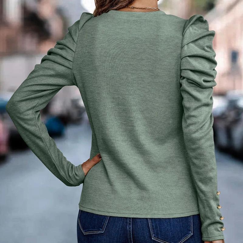 Top da donna a maniche lunghe con maniche a sbuffo e collo rotondo