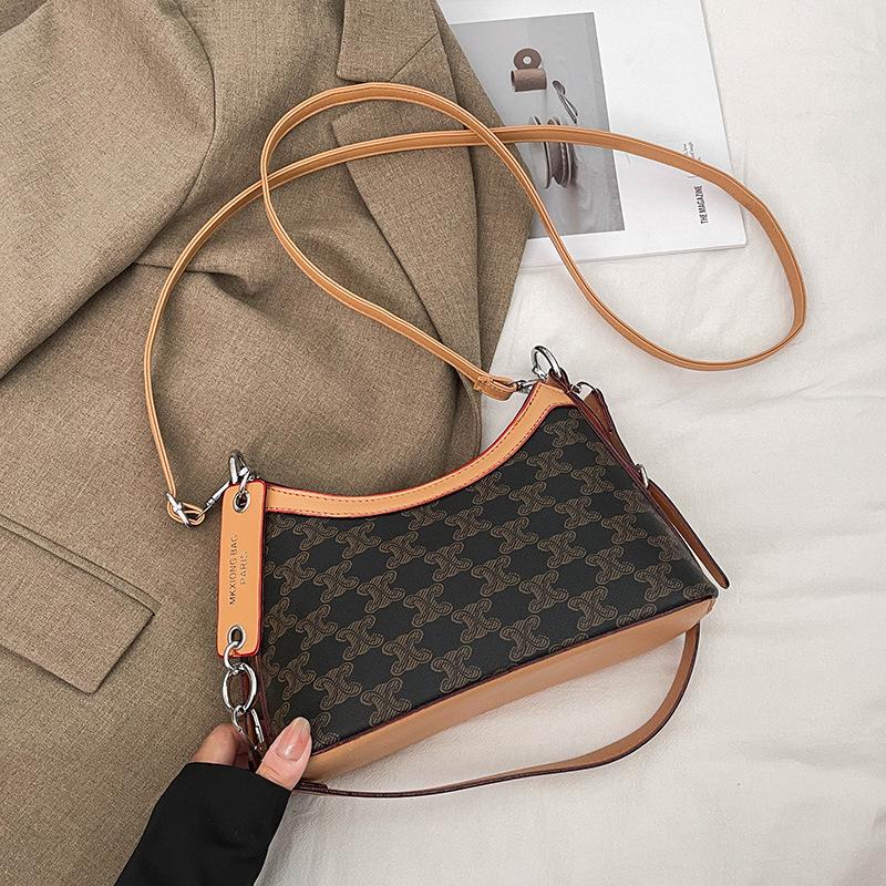 

Женская универсальная осенняя сумка кроссбоди на плечо высокого класса 2025 23x10x16 cm кофейный