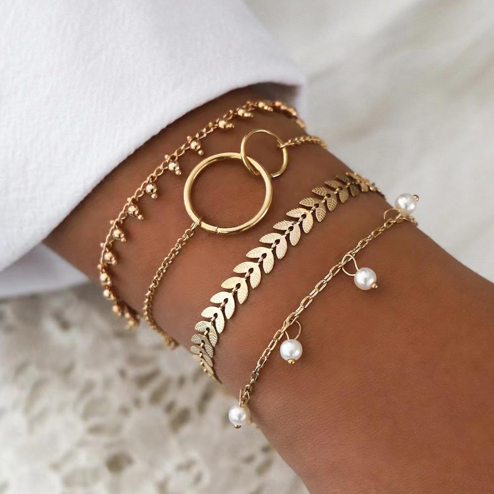 

Geometric Circle & Arrow Pearl Pendant Bracelet Set: 4-Piece Collection