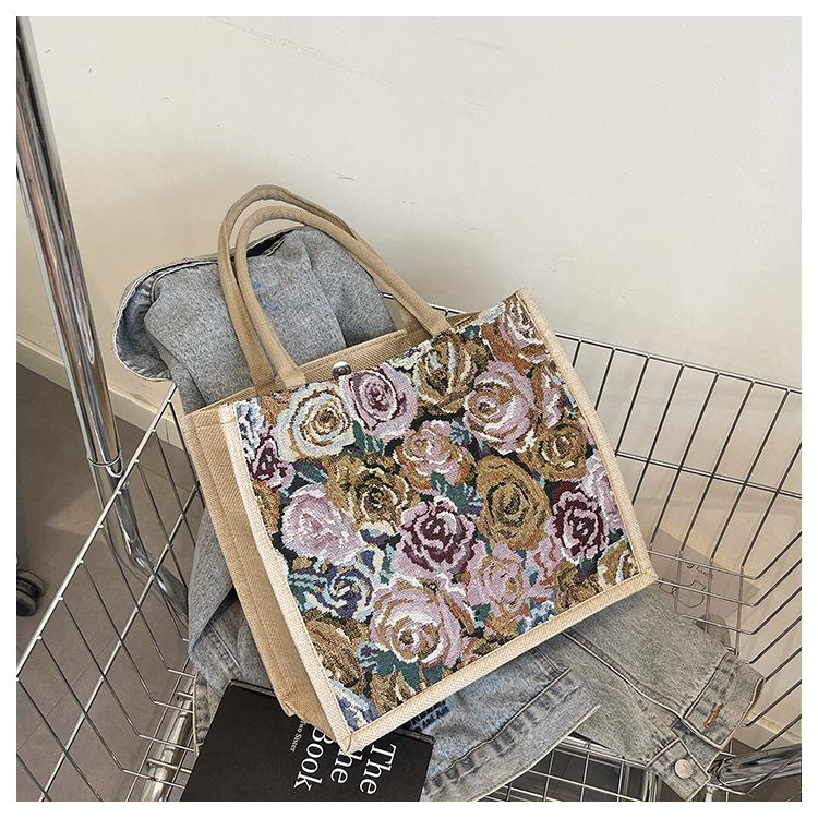 

Large capacity linen tote bag 2025 new floral commuter tote bag female student class shoulder handbag розовый