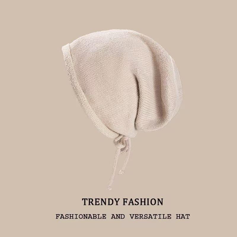 

Стильна жіноча в язана шапка, що відкриває обличчя, з захистом для вух та шнурком, 2024 off білий колір