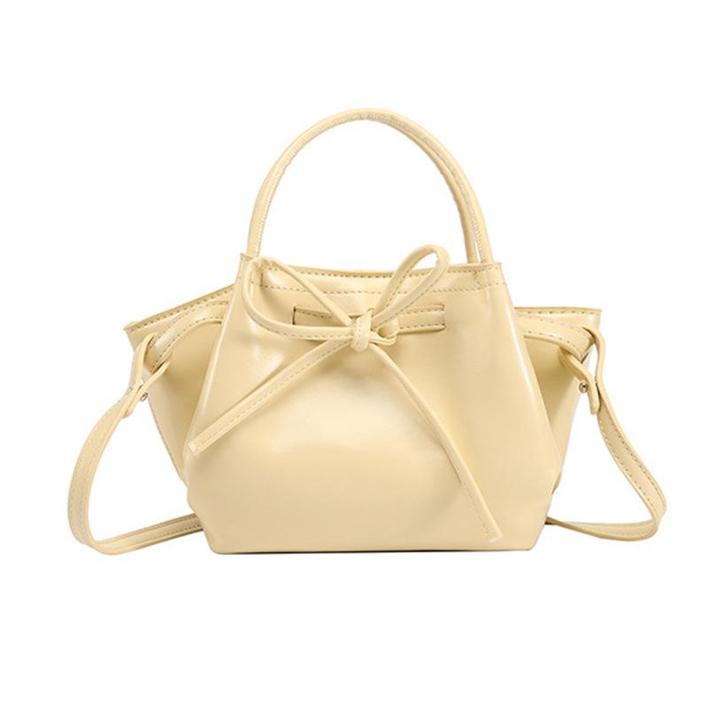Korean Niche Portable Vegetable Basket Bag Women'S Spring Summer Fashion Bucket Bag Bow Messenger Bag