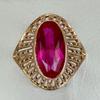 Vintage Hollow Copper Ring with Oval Red Artificial Gem for Women, Suitable for Banquets and Formal Occasions.