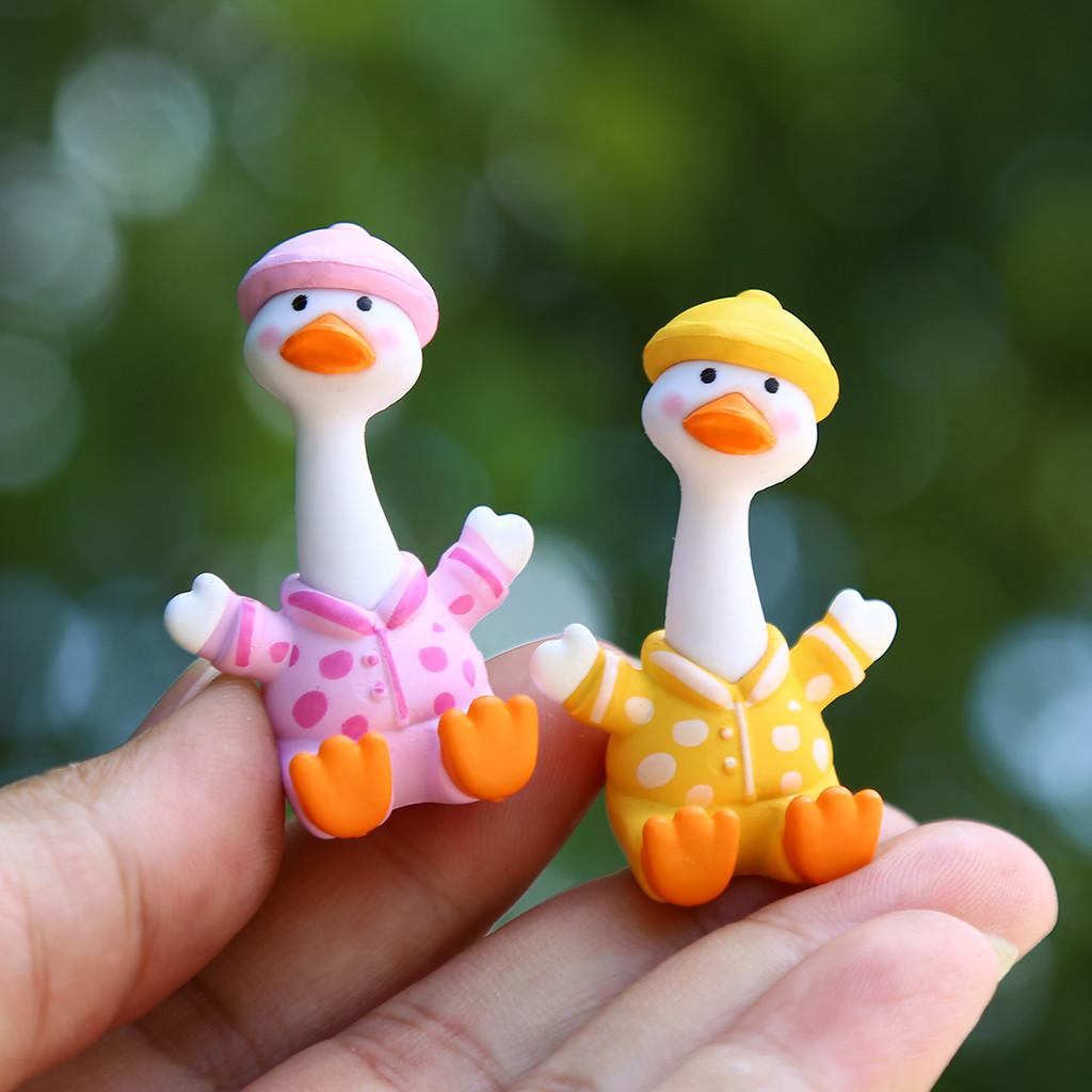Pvc Whimsical Duck Toy With Eyes Tilted For Kids And Collectors