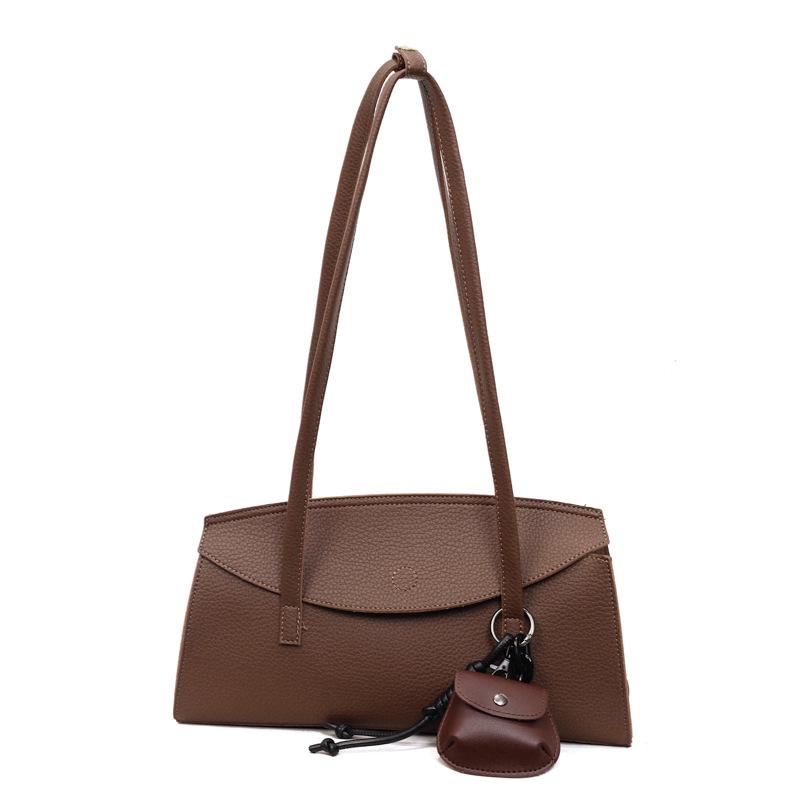 Ein-Schulter-Tasche, Modische Achseltasche, Trendiger Design-Sinn, Pendler-Handtasche