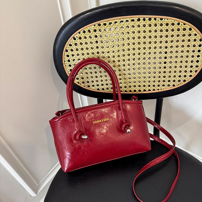 New retro niche design portable bucket bag temperament personality simple casual messenger bag bag women
