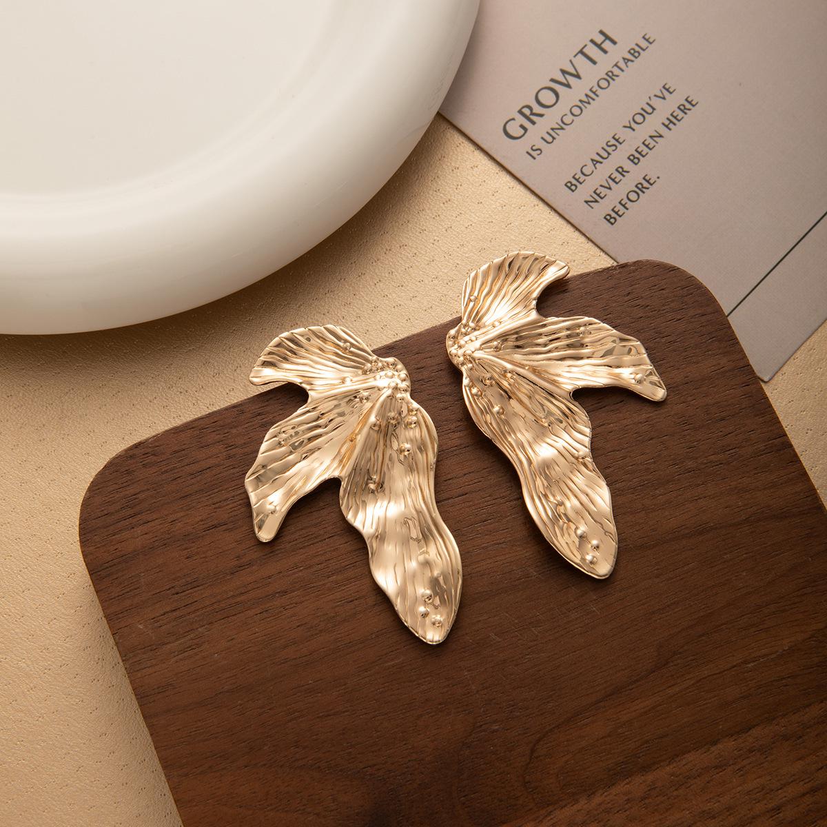 Exaggerated Metal Leaf Texture Earrings: Irregular Pleated High-End Fashion Studs for Women