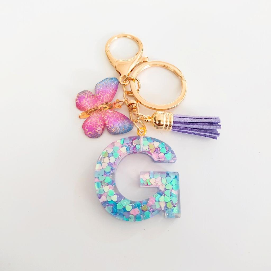 Fashion butterfly fringe initial keychain Drop glue Blend sequin A-Z26 letter keychain Cute Ladies Student Bag Accessory Gift