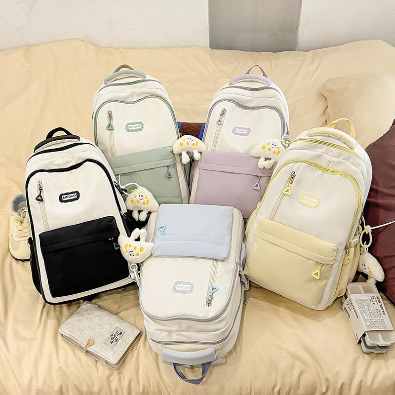 2025 summer new large-capacity literary and versatile high-value schoolbag female junior high school students simple and lightweight backpack