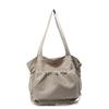 2025 new large-capacity drawstring canvas bag casual Korean version women's solid color daily commuting shoulder tote bag women