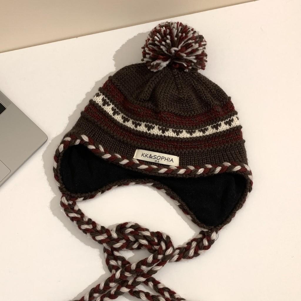 Knitted Chic Cozy Winter Hat For Women Featuring Colorful Pom Poms Warmth And