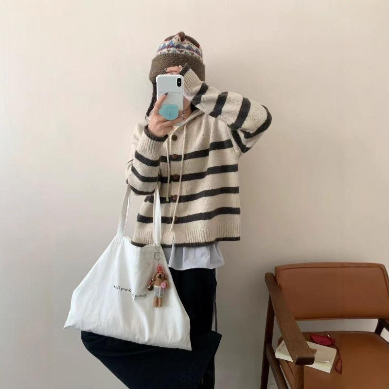 Autumn and winter new striped knitted women's clothing, loose retro hooded women's knitted sweater cardigan women's