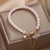Natural Pearl Bracelet French Design Sense Iron Suction Buckle Beaded Bracelet Zircon Bee Pendant Bracelet.