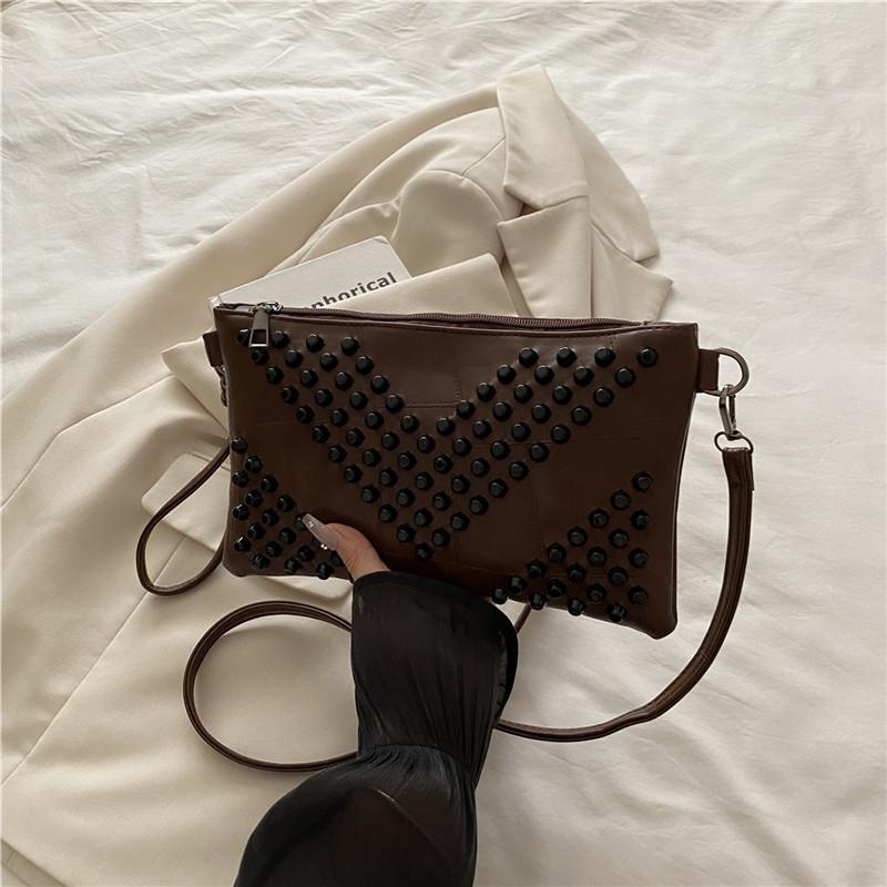 

Niche design retro rivet envelope bag messenger bag women s black shoulder bag underarm bag mobile phone small square bag