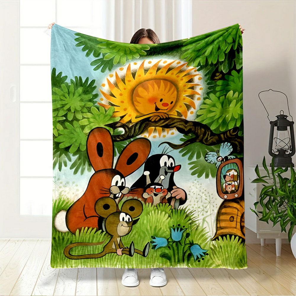 A cheerful sun and cartoon animals gather amid trees, grass, and flowers. for all seasons blanket lunch break throw gift