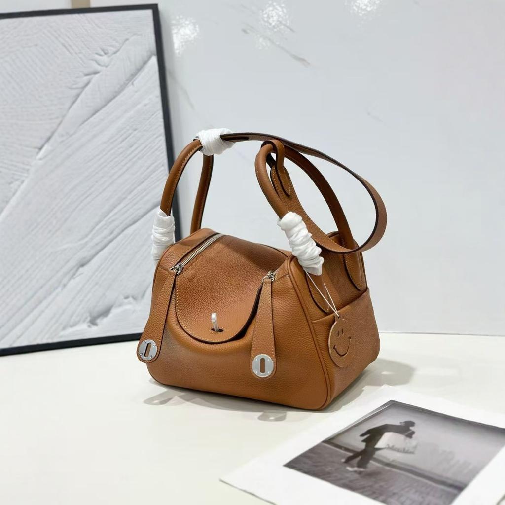New leather pillow bag women's bag one-shoulder hand-held fashionable and versatile temperament mature woman bag