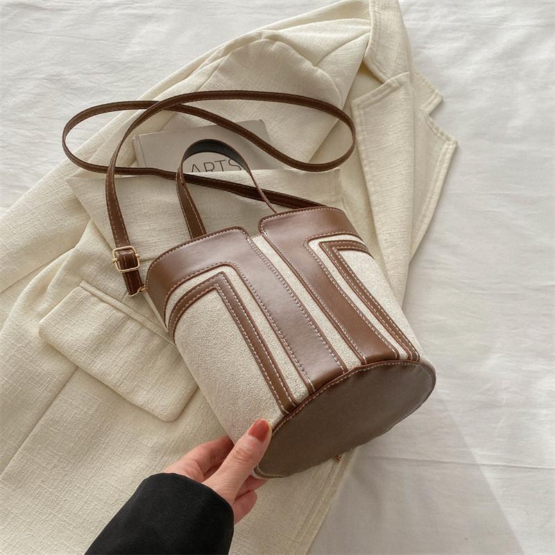 

Fashionable Color-blocked Women s Hand-held Small Bag 2024 Early Spring New Casual Simple Bucket Bag Retro Handbag Shoulder Bag