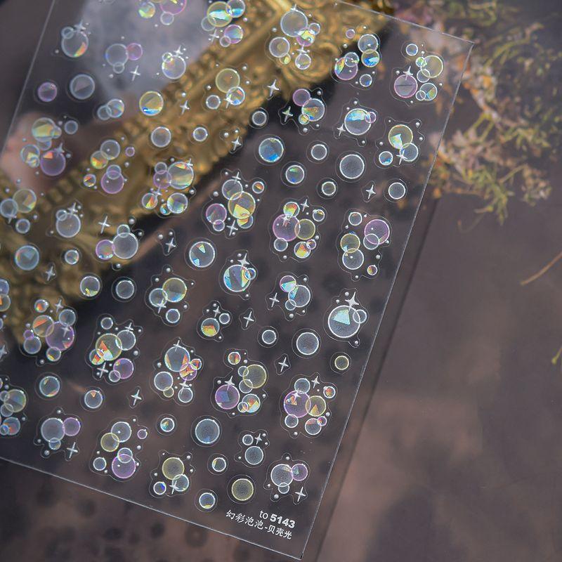 

Tomoni Shell Light Nail Sticker Best Selling Minimalist Wind Ice Transparent Nail Sticker Magic Color Bubble Ornament Stickers 5143 Default