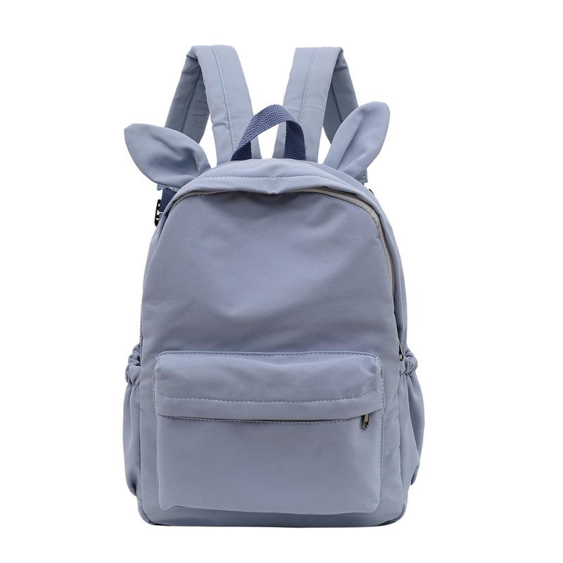 Schoolbag Korean fashion backpack 1011 new rabbit ears solid color backpack trendy campus personalized student bag