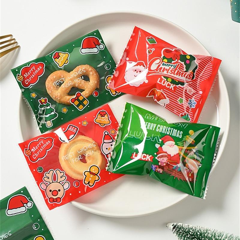 100Pcs 7x10cm Plastic Christmas Machine Sealed Bags Snowflake Pastry Candy Cookie Xmas Party Gift Packaging Supplies