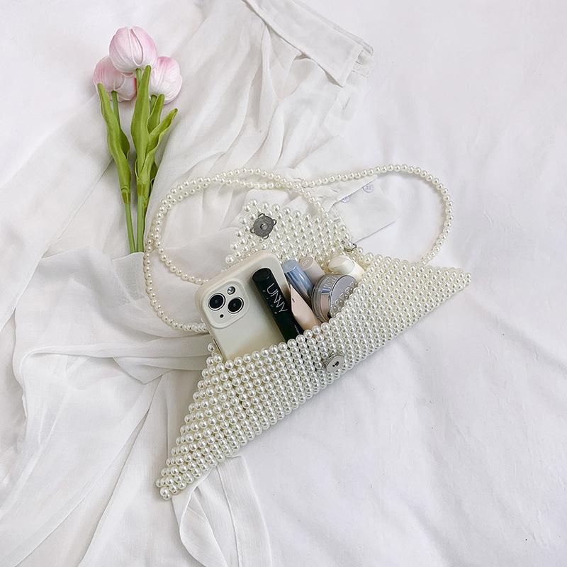 Holding pearl bag women's new spring and summer fashion woven bead small square bag temperament shoulder bag