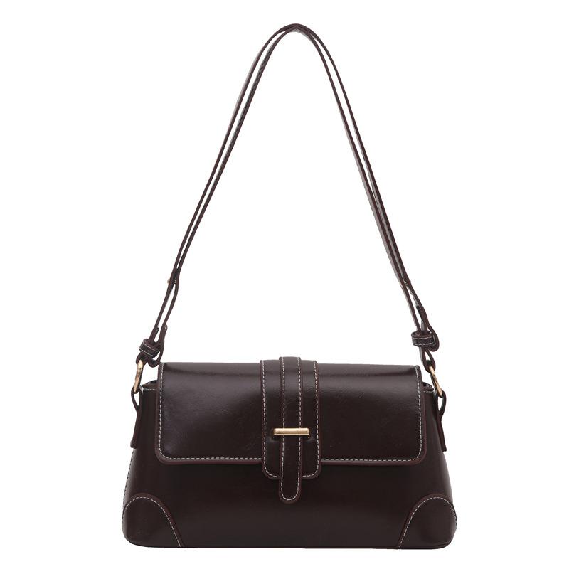 

New texture retro shoulder bag temperament versatile commuter small square bag niche design color matching fashion bag темно-коричневого кольору