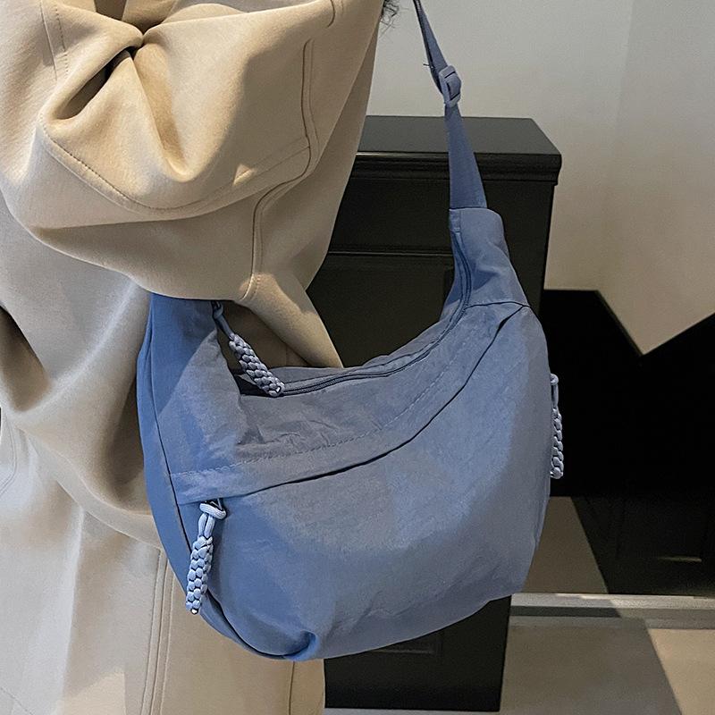 Trendy new products ins simple fashion lightweight sports style dumpling bag leisure travel versatile solid color messenger bag women