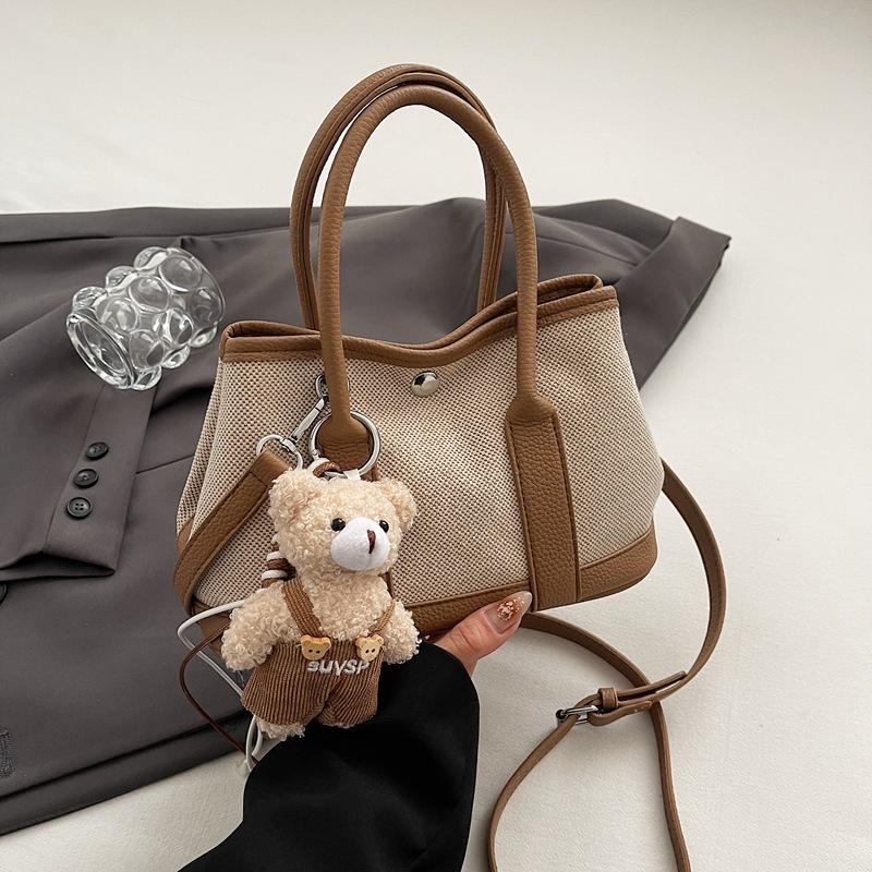 Summer new fashion contrast large-capacity hand-held bucket bag women's simple casual commuter shoulder body bag