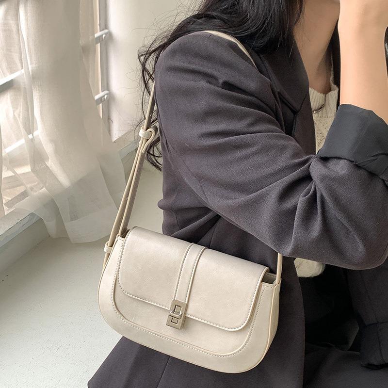 Niche Design High-end Clamshell Shoulder Armpit Bag Women's Fashion Commuter Versatile Saddle Bag