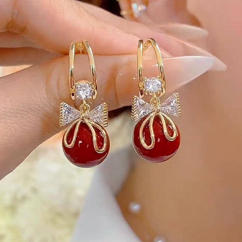 Burgundy Bowknot Pearl Earrings: High-End Dangle Studs for Women - Luxury Autumn/Winter Niche Design New Year Accessories