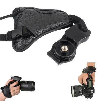 Professioneller Weicher PU-Leder Handgriff Halter Handgelenkband mit einem Schraubenloch Riemen für Canon/Nikon Spiegelreflexkamera Dreieckiges Handgelenkband