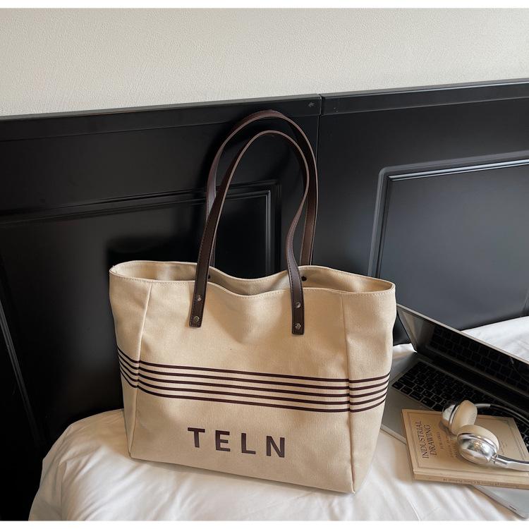 

Korean children and mothers canvas bag women s large-capacity leisure versatile commuter to work shoulder bag fashionable new tote bag хаки