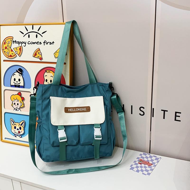 

2025 школьный сезон сумка для репетиторства студенческая сумка большой вместимости сумка для занятий цветовая гамма повседневная простая нейлоновая на плечо мессенджер one size fits all синий