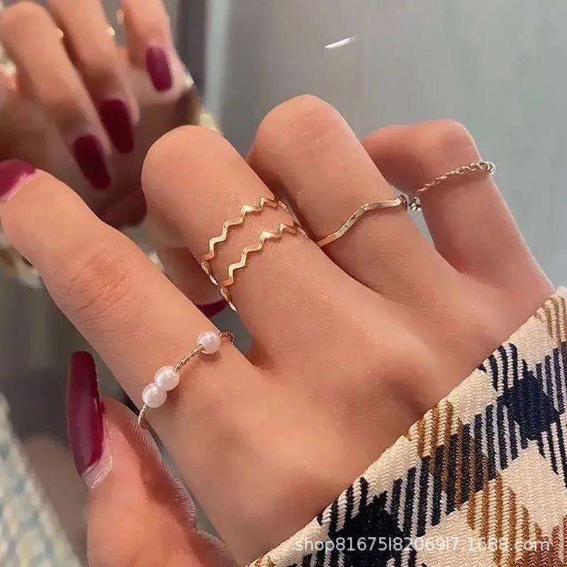 Super fairy butterfly four-piece ring, female ins personality index finger ring, Internet celebrity cold wind niche design ring