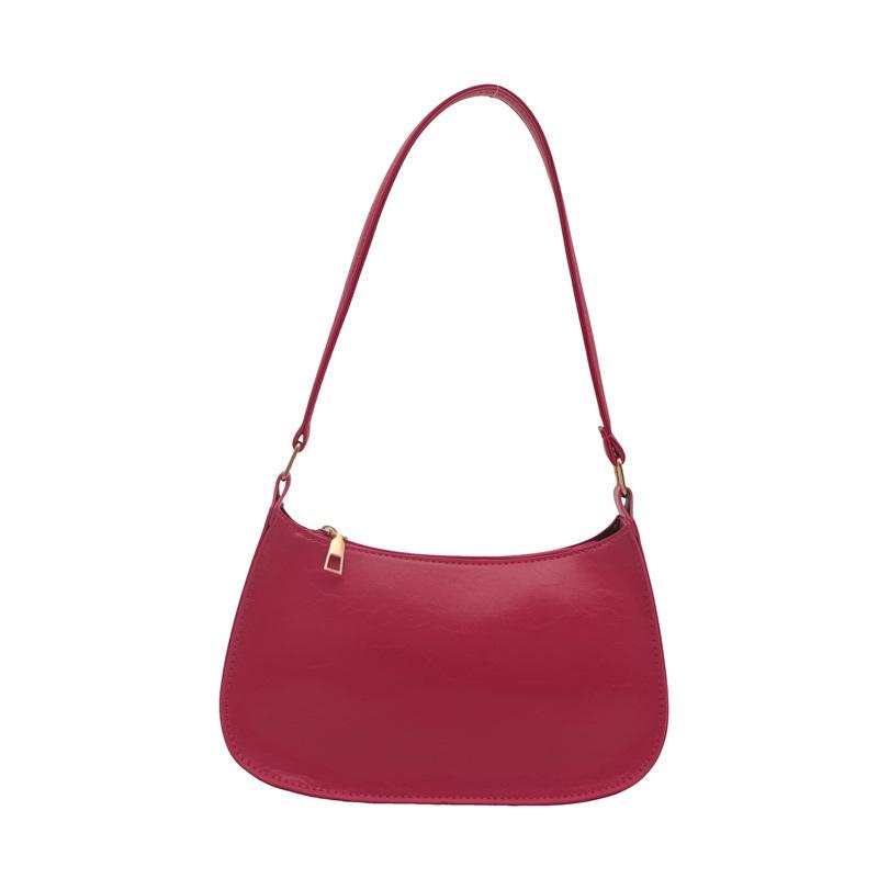 

Korean version of the trend underarm bag niche design shoulder bag new bag women s casual simple handbag portable троянди рожеві кольору