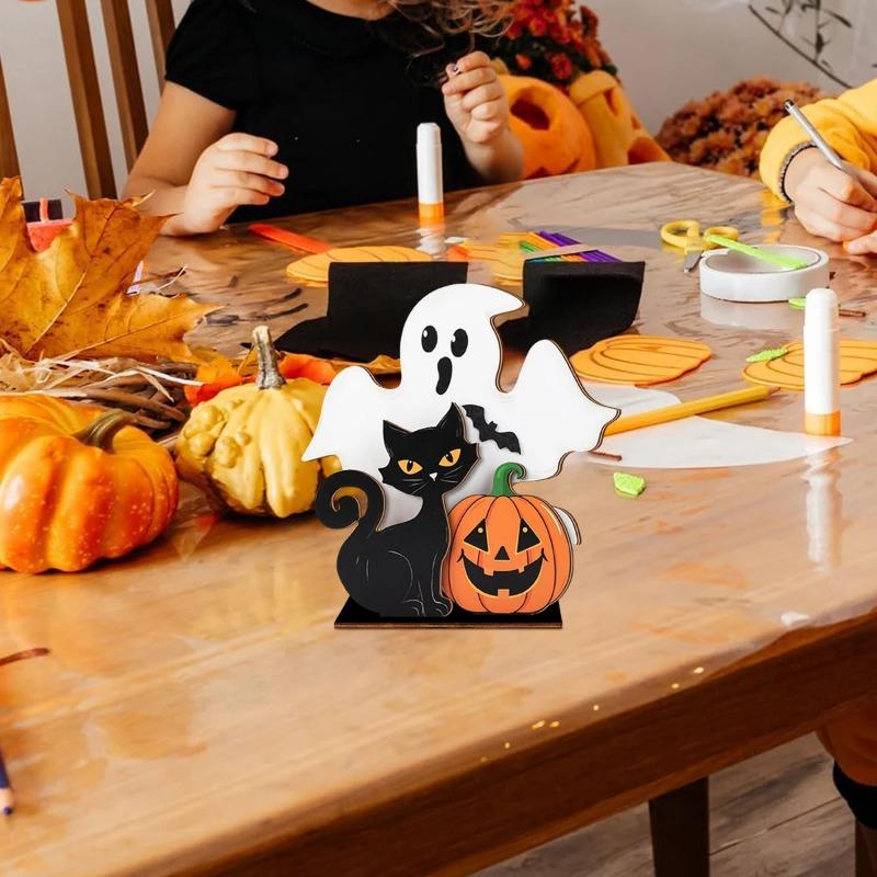 Halloween wooden decorations: ghost statues, black cats, and pumpkins, used for home party decoration