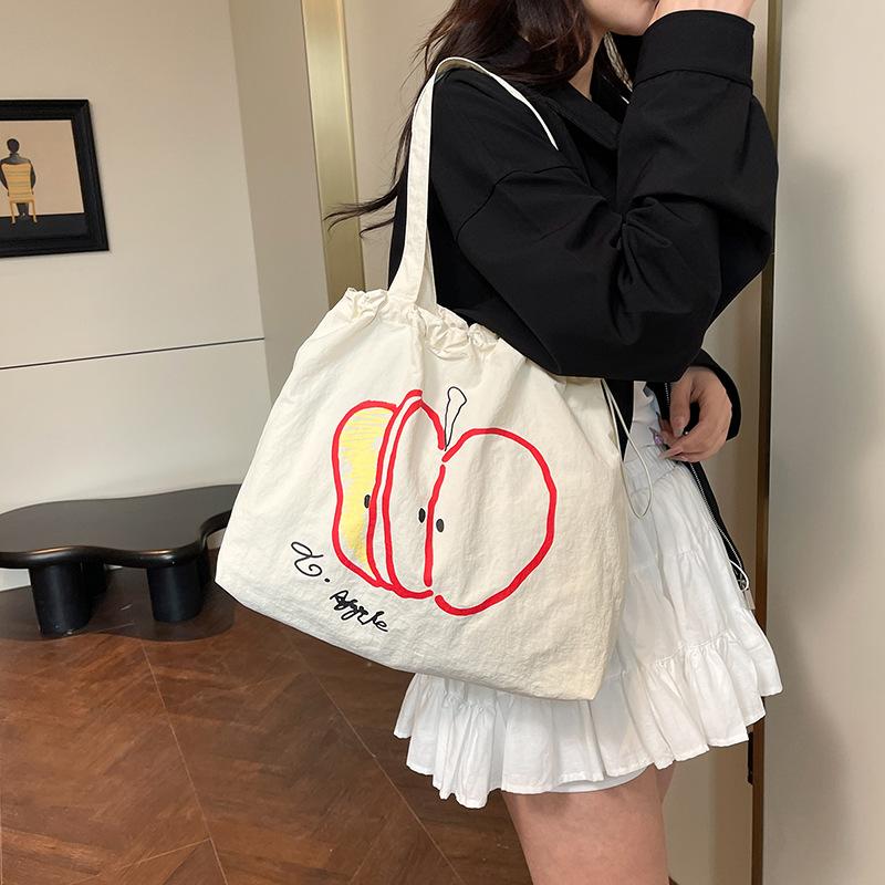 Summer drawstring nylon shoulder bag women's versatile red and white contrasting apple slices portable tote bag