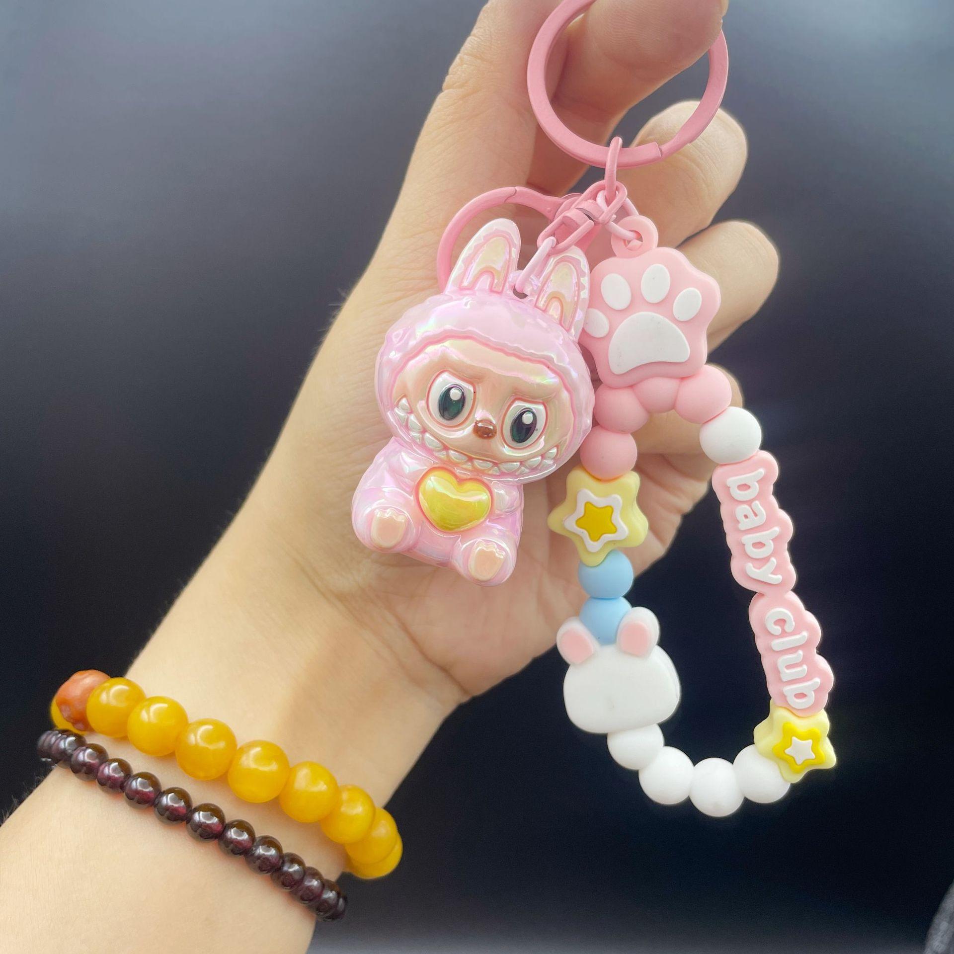 

Популярный сидячий Лабубу брелок Лабубу Кроссдрессинг Милая кукла Маленький подарок розовый